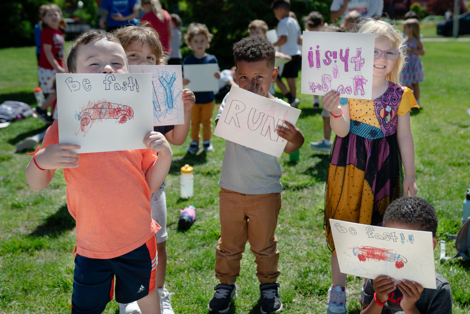 Kids cheering runners on at police 5k